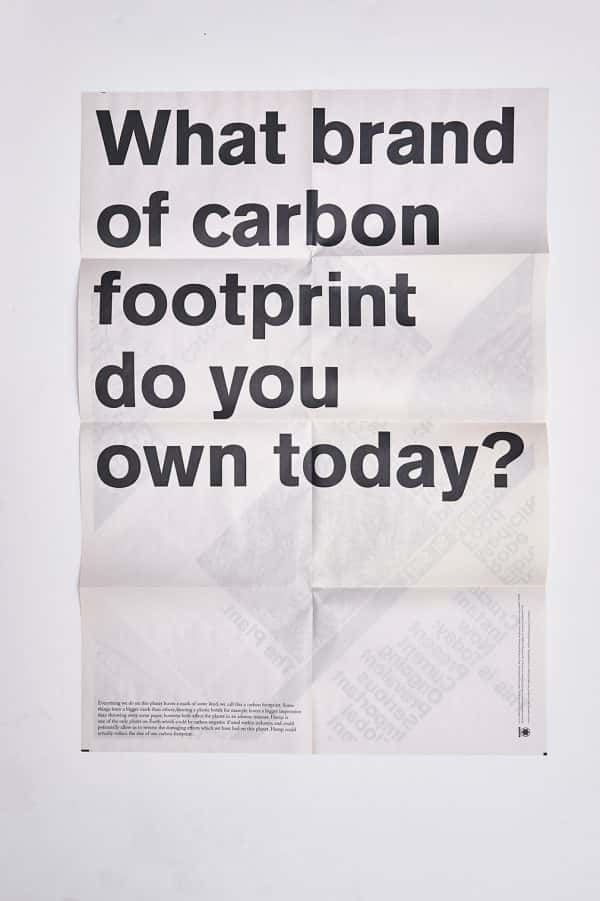 Curtis Euan-Page - Folded poster which reads What brand of carbon footprint do you own today?