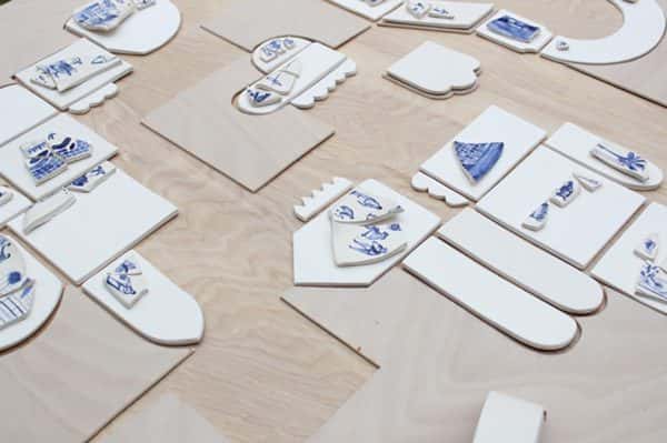 Polly Fern-Sargent - Wooden shapes with blue embellishment layed out