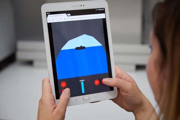 Submarine game prototype - Games development student testing a game on a tablet