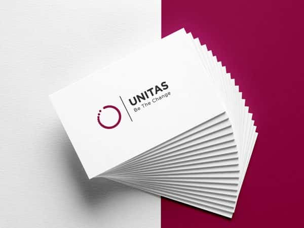 James Ward - Business cards for 'Unitas' with white card stock, red logo graphic on the ledt, and 'Unitas be the change' in dark grey sans serif type on the right