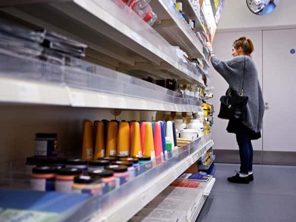  - Racks of art supplies at the Norwich University of the Arts campus shop