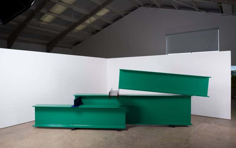 Sculpture Seven, by Anthony Caro showing a steel painted green, blue and brown
