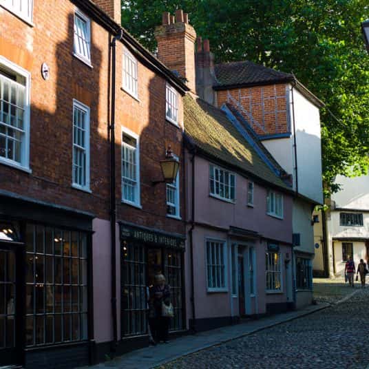  Image showing bottom of Elm Hill with cobbled streets and pastel buildings